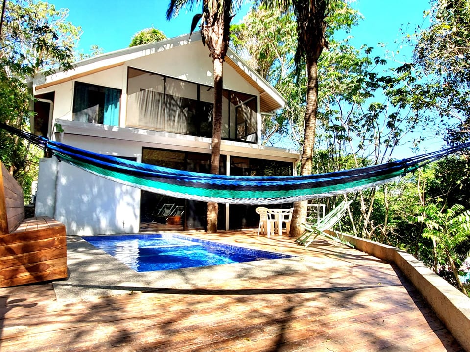 Backyard with private pool. All new teak wood decking and bench seating.