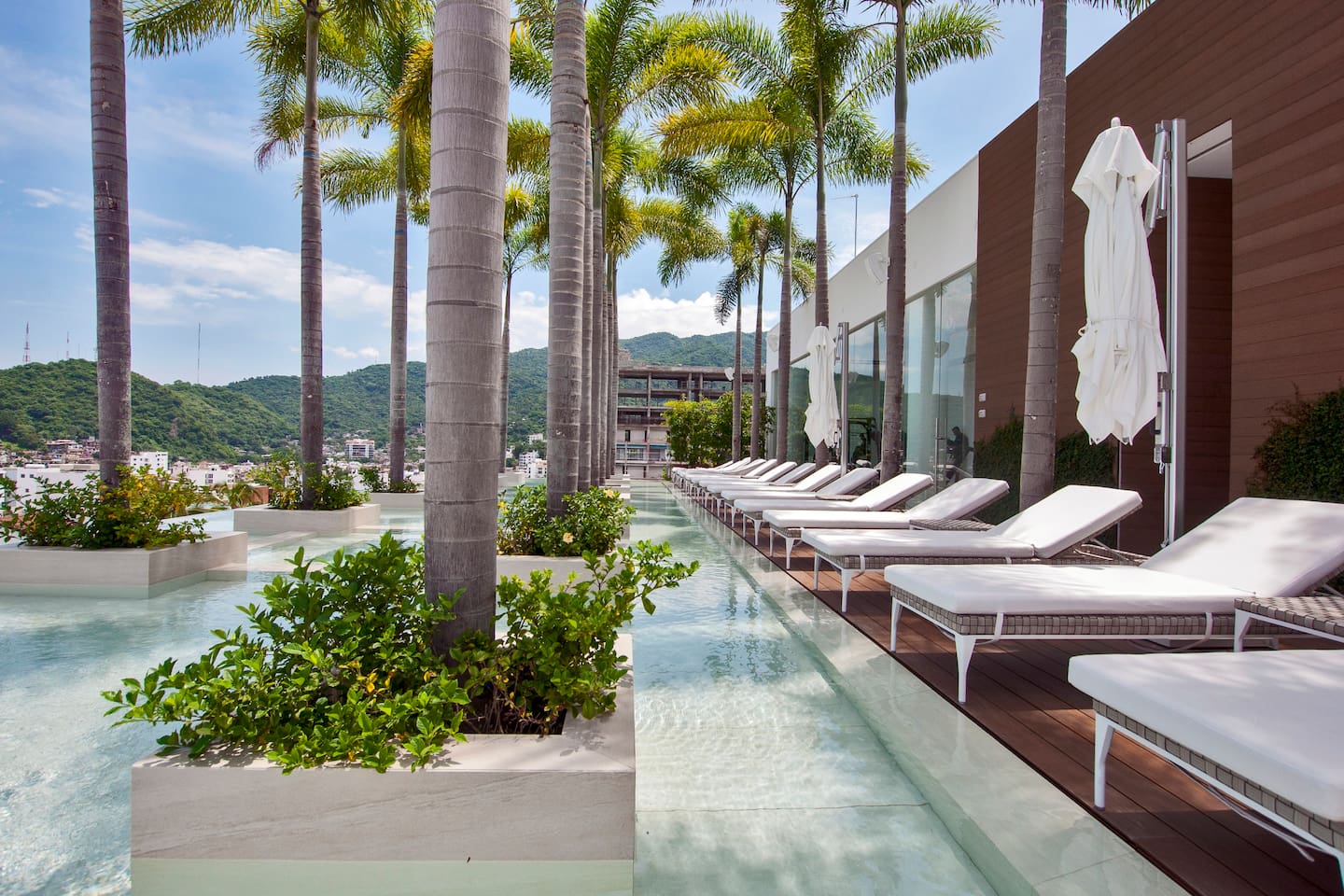 Rooftop w/ chaise lounges to relax and unwind.