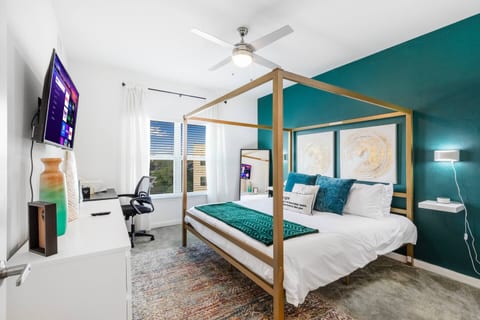 Unwind in this beautiful King size bed at the end of a long day. Work from this location using the dedicated workspace equipped with a printer and phone charging station. 43-inch Smart TV.