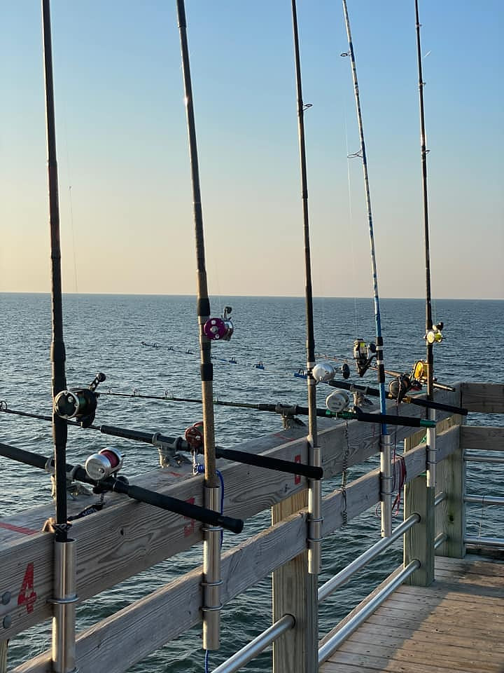 There are two fishing piers - Oak Island Pier is public. Ocean Crest charges for access but you can also rent fishing gear there.  There are public fishing docks on the intracoastal side and the bait and tackle shops in town are helpful with advice.