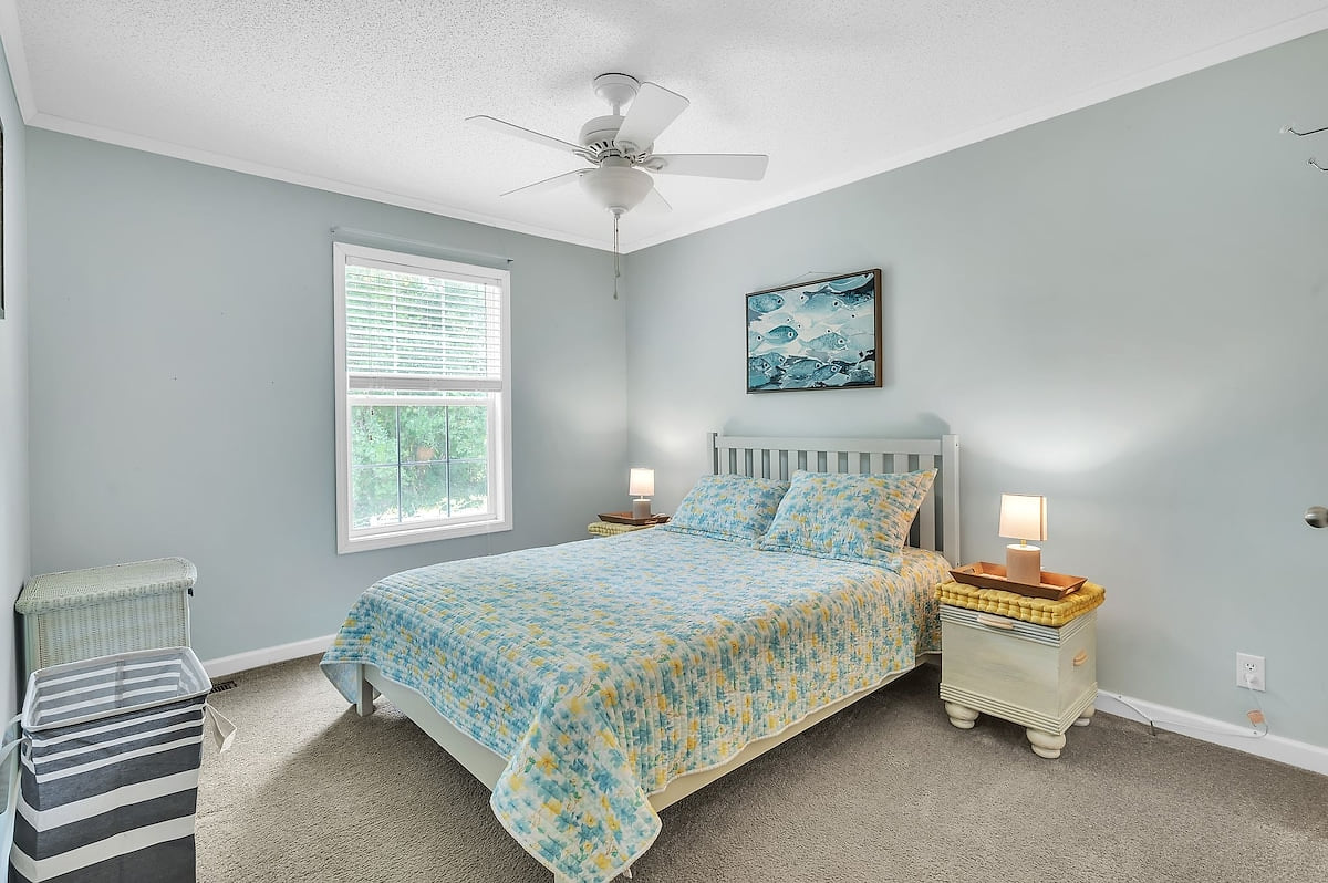 We call this the Queen Room - a comfortable bed, nice lighting and a dresser (not shown)