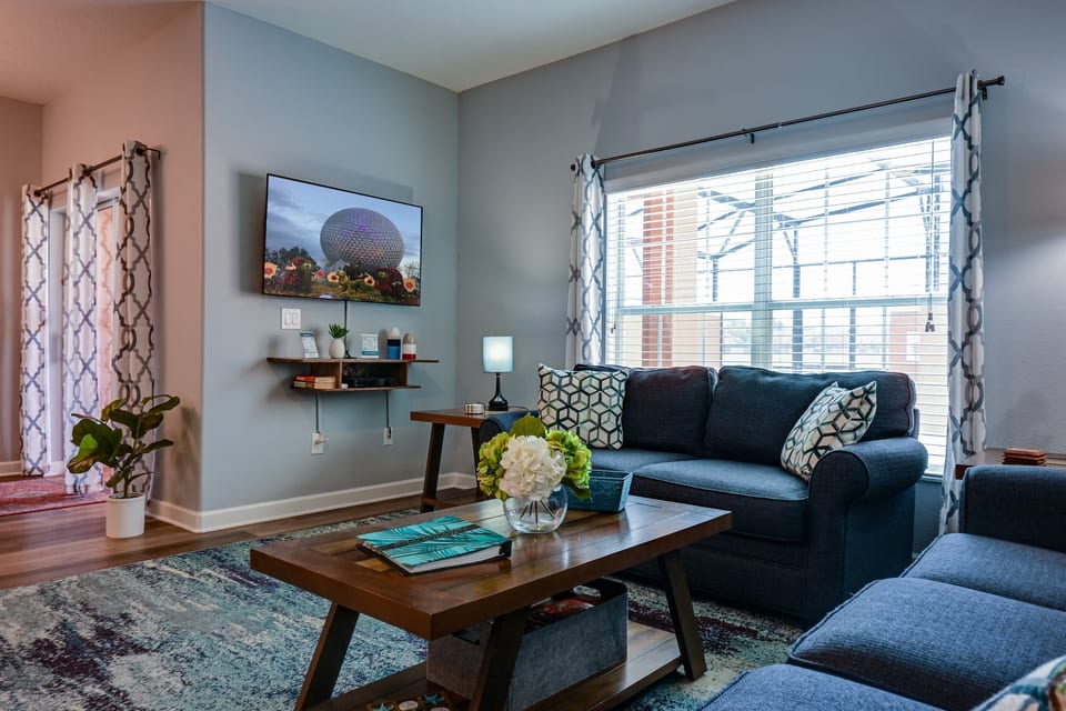Den with wall mounted TV