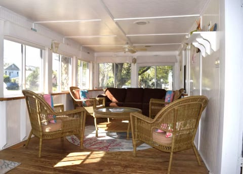 Relax, read, people watch, nap, or socialize in the sunroom. Enjoy the sea breeze with the windows open, or the heat or air conditioning with the windows closed.
