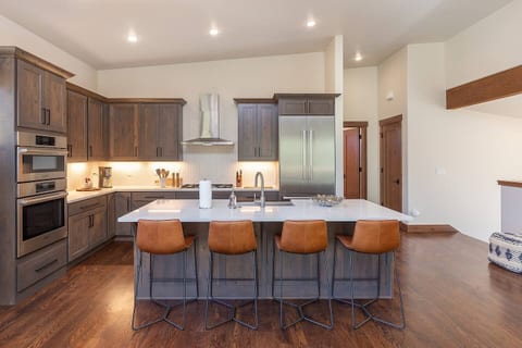 A Gourmet Kitchen with plenty of room for everyone to gather with the chef