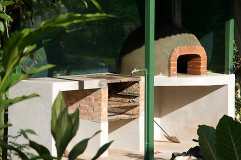 Outdoor kitchen with Grill and Clay Oven