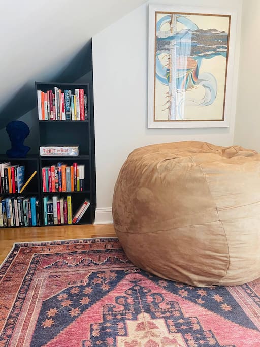 Kids love exploring the library! Settle into the super comfy beanbag and choose from our hundreds of books to read. You'll also find board games and cards here. 