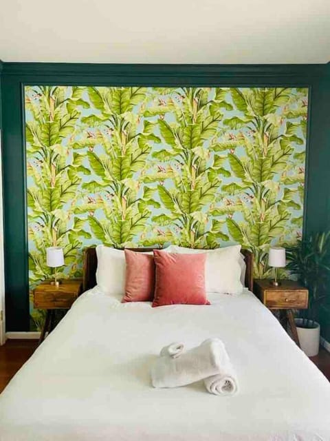 One of two bedrooms on the ground floor, this bedroom has a queen sized bed and en-suite bathroom. 