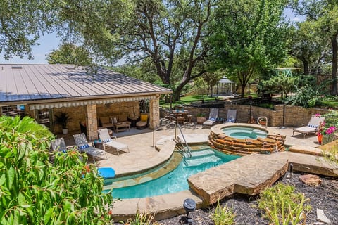 Absolute paradise. 5 acres of total seclusion. Note, a large resort-style umbrella has been added over the oversized hot tub. 