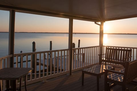 Relax and unwind while enjoying the sunset on your private porch