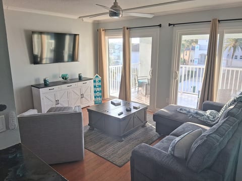 Plenty of natural light from large patio doors, leading to oversized balcony. 