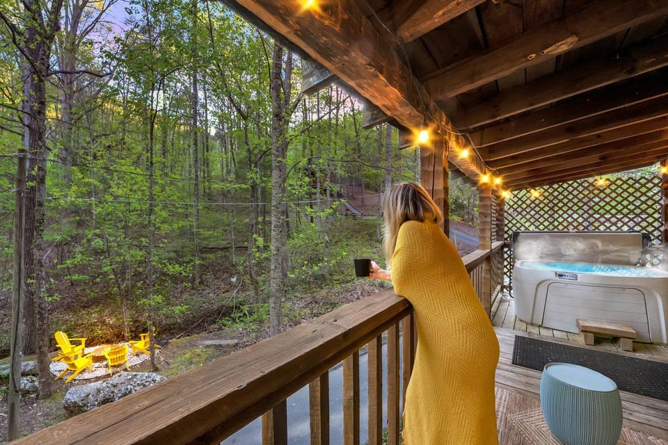 Take in the sights from your private deck. Mornings bring steaming coffee and gentle birdsong, evenings offer crackling fires under the stars—your perfect Smoky Mountain escape where time slows down just for the two of you.