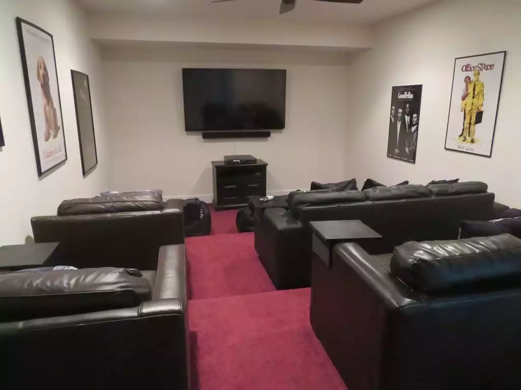 Movie room with large-screen TV, blu-ray and surround sound system Movie room with large-screen TV, blu-ray and surround sound system - Tall Oaks Cove on Lake Anna - Mineral