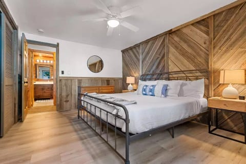 The master bedroom features a comfortable king, nightstands for each guest, and device chargers as well to let you and your devices recharge for another day of exploring Door County!