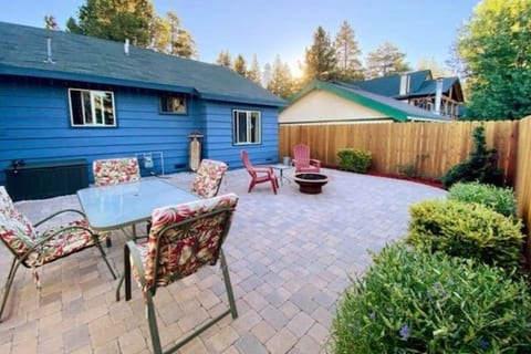 Fully fenced back patio with gas fire-pit and ski slope views of Bear Mountain.