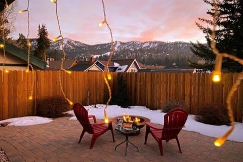 Fully fenced back patio with gas fire-pit and ski slope views of Bear Mountain.