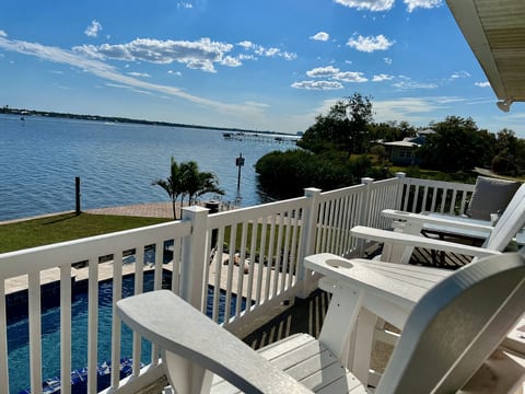 Riverfront 4BR: Heated Pool, Hot Tub, Boat Dock