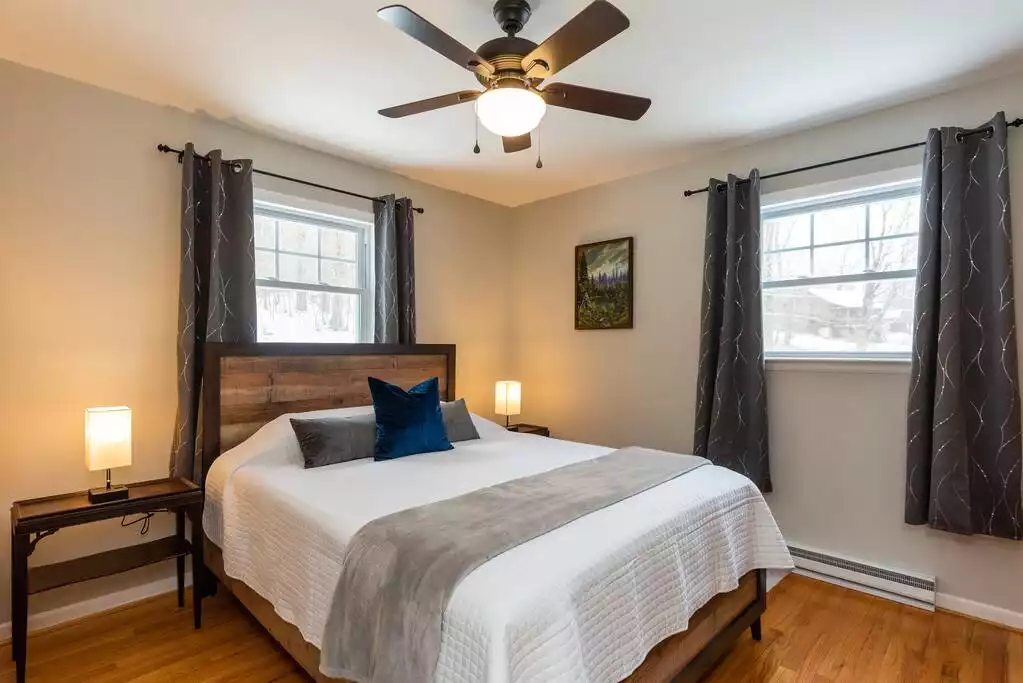 Second Bedroom - Queen side bed with radiant heating, dresser and mirror. Second Bedroom - Queen side bed with radiant heating, dresser and mirror. - Private Getaway With Hottub, GamesRoom & Woodstove - Roxbury