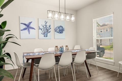 Spacious dining area with seating for up to 8 guests—perfect for family meals and group gatherings.