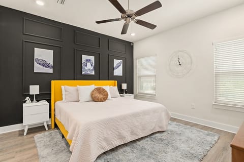 The spacious master bedroom includes a smart tv and additional dressers for an ample amount of storage during your stay.