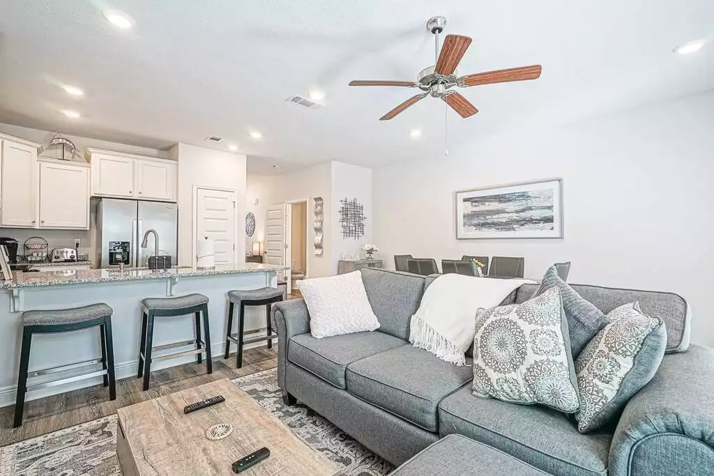 Spacious living room area to kick your feet up and enjoy a lil entertainment. - Sandestin Retreat - Modern Townhome Near Beaches! - Santa Rosa Beach