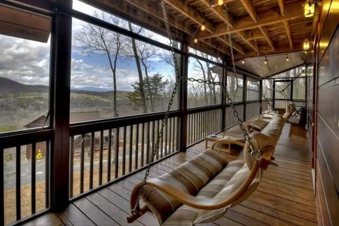 Sit on the back porch in a double swing for the perfect view of the sunset going down over the mountain ridge. 
