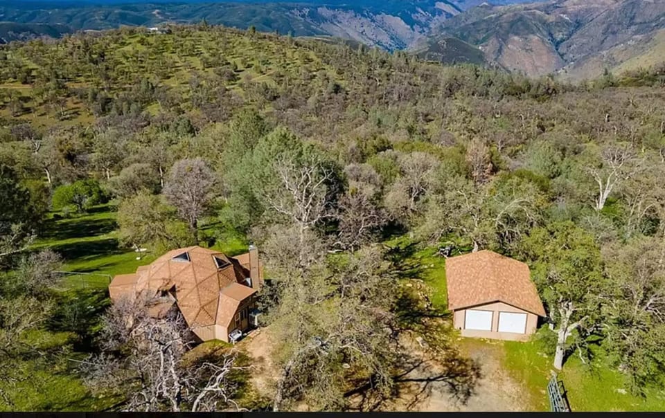 Unique dome house surrounded by nature.
