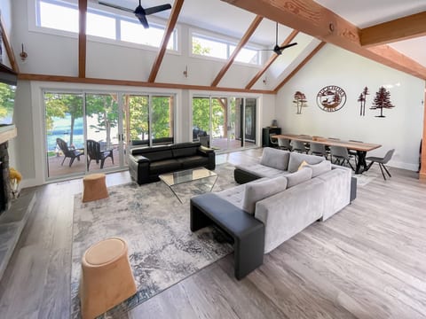Living and Dining Room with 16 ft Ceilings Facing Waterfront