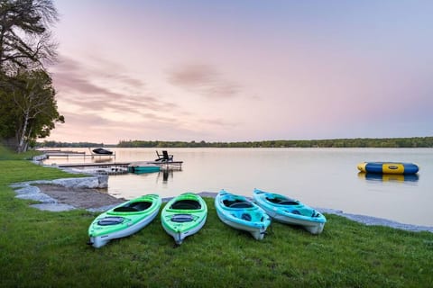 Canoe, paddle boat, trampoline at waterfront 
