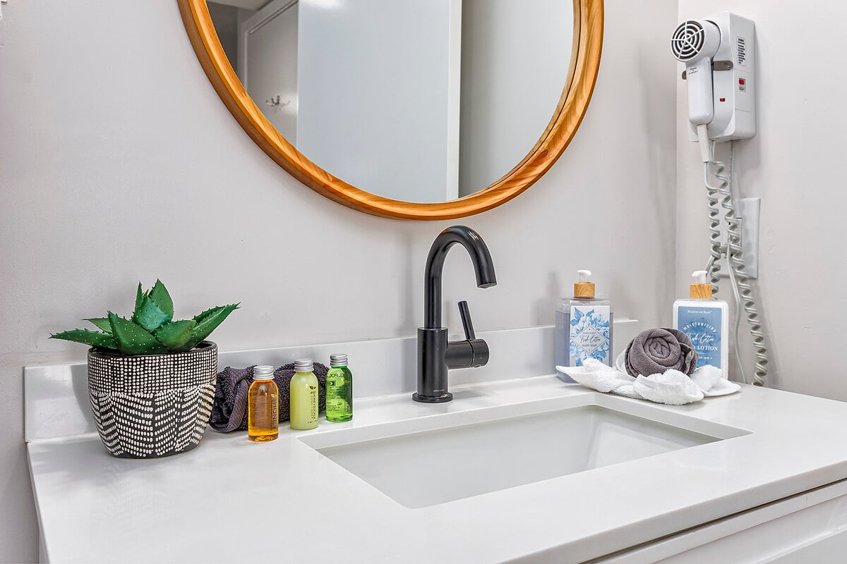  Spa-Like Master Bathroom
Unwind after a day in the sun with a refreshing shower or a relaxing soak in the beautifully updated master bathroom.