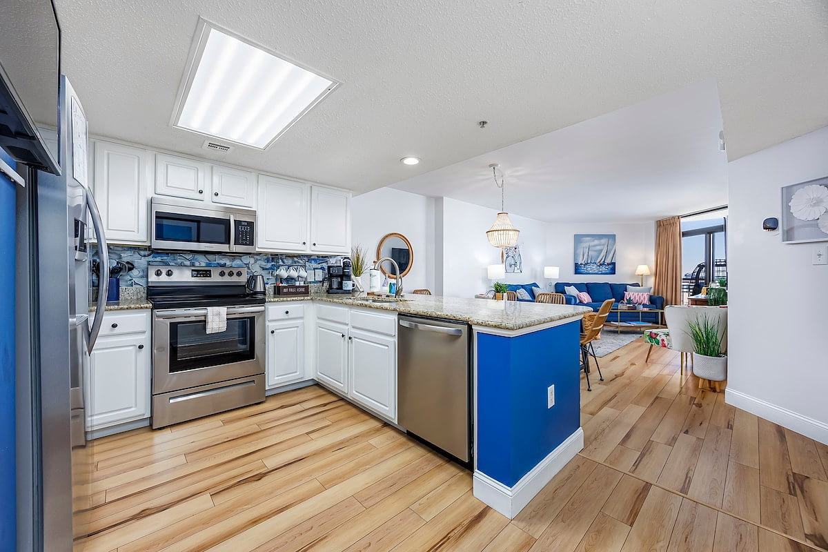 Full Kitchen with Granite Countertops, Full size stainless steel appliances & Spacious Cabinets 