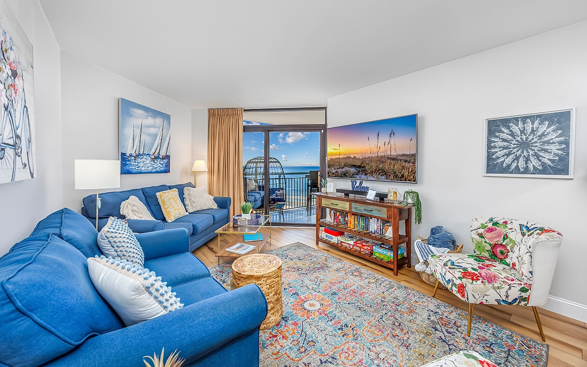 Spacious Living Room with Ocean Views
Relax in our comfortable living area featuring panoramic Atlantic Ocean vistas, perfect for unwinding after a day at Myrtle Beach.