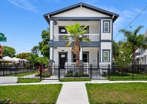 Stunning front view of the house showcasing the front yard and parking area that is equipped with CCTV cameras to ensure your safety during your stay. If you are interested in this property, send us an inquiry now!