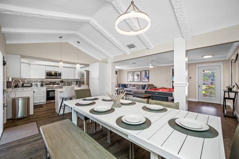 Nothing beats homecooked meals shared together! Enjoy meals with family in this elegant dining table that seats 8 people. Book your stay now!