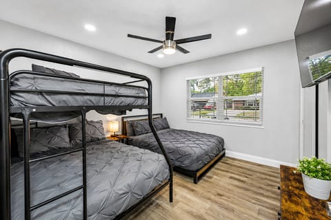 Bringing your kids on this trip? This room would be amazing for them to have! This bedroom has a king size bed and a bunk bed!