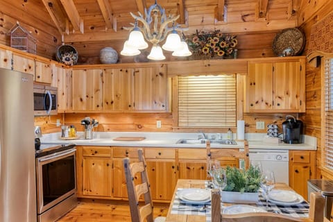 Kitchen stocked with everything you may need to cook.