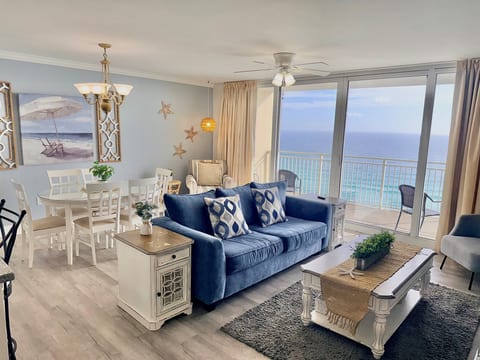Beachfront Living Room with Floor-to-Ceiling Gulf Views • New 2025 Queen Sleeper Sofa • Smart TV • Direct Balcony Access