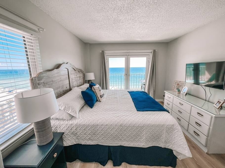 Wake up surrounded by gorgeous emerald Gulf water in our beach front Primary Bedroom.