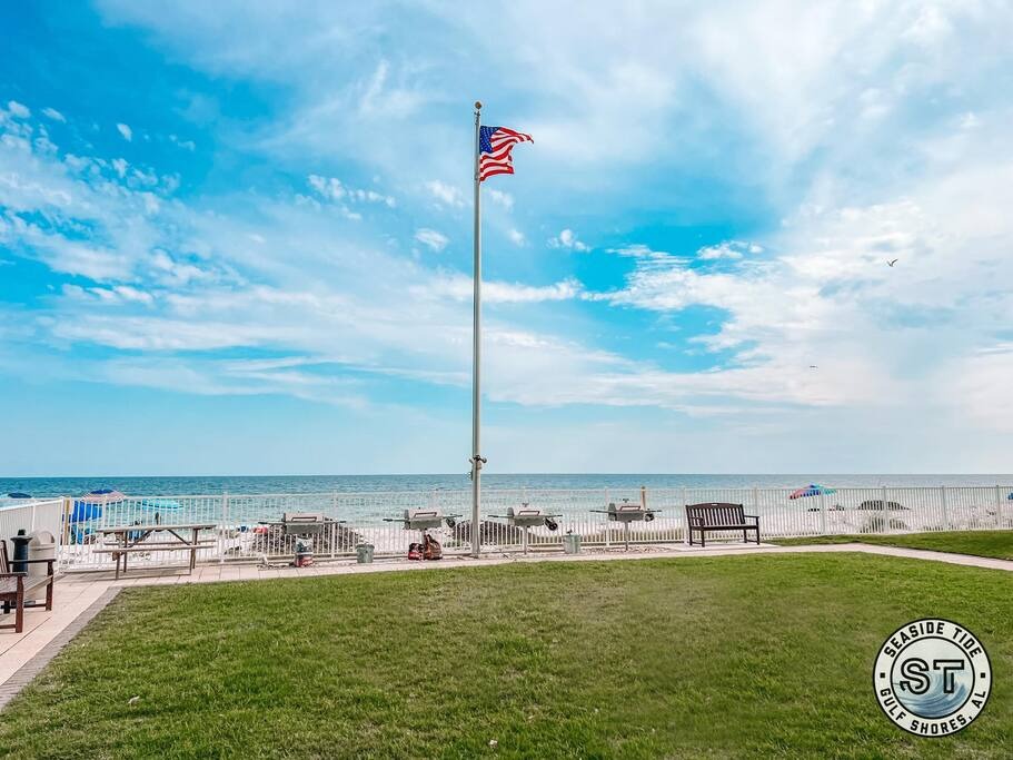 Outdoor grilling and picnic table area. 
