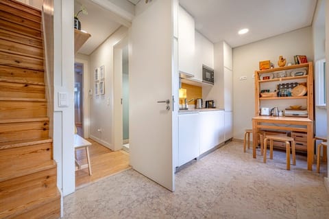 Kitchen: Sunlit with stylish decor, perfect for culinary adventures and delightful meals!