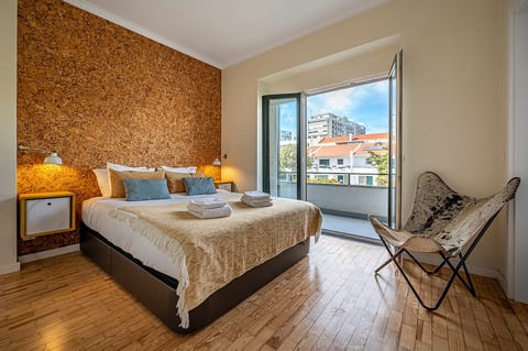 Dreamy Bedroom: Enjoy sunlit mornings and urban views in this stylish retreat!