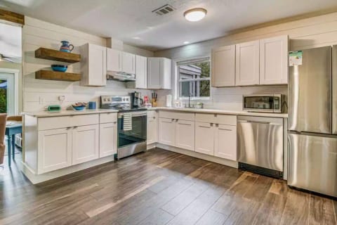 Full Kitchen is nicely equipped to enjoy meals at home. All new appliances, dishes, glassware and pots and pans.