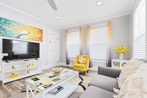 The living room is a comfortable place to relax and enjoy a dash of sunshine.