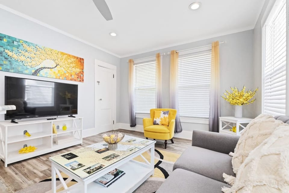 The living room is a comfortable place to relax and enjoy a dash of sunshine.