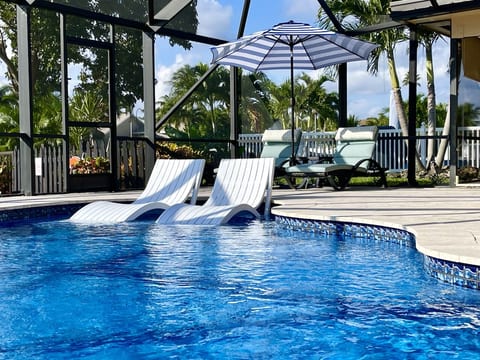 Tanning ledge.. salt water pool: covered pool enclosure