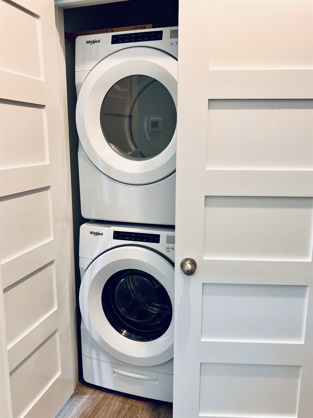 Hallway full size Washer and Dryer