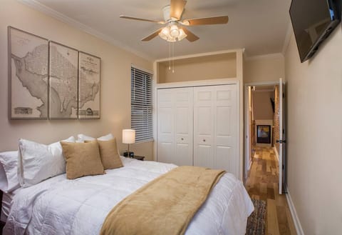 Bedroom 1 with queen-sized bed, satellite TV and closet