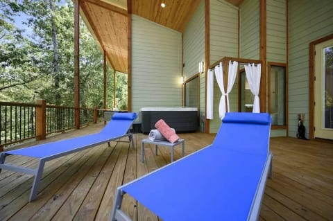 Triple threat: lounge chaises, hot tub, & outdoor shower