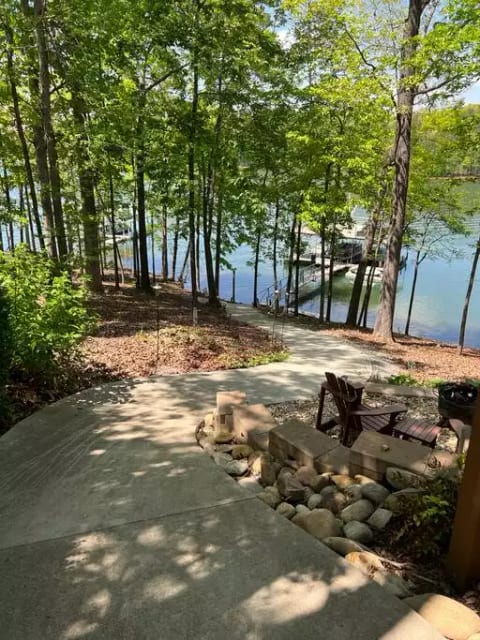 Concrete walkway to water.