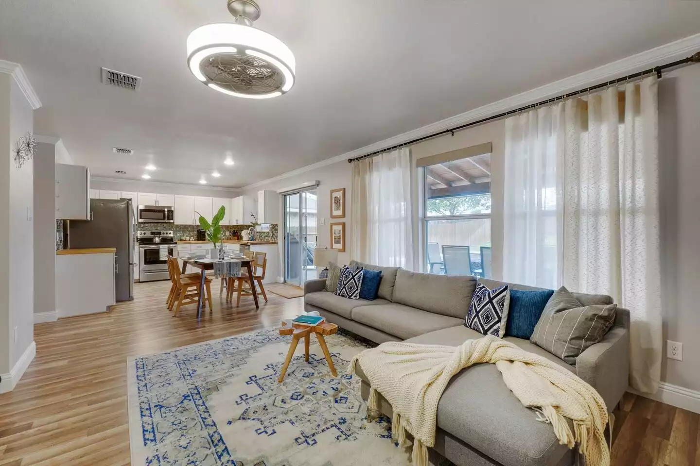 Open concept living room, kitchen and table that looks out to the pool! Open concept living room, kitchen and table that looks out to the pool! - The Coastal Breeze - Keller