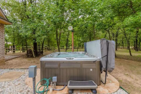 Relax all your cares away in the hot tub with seating for 6!